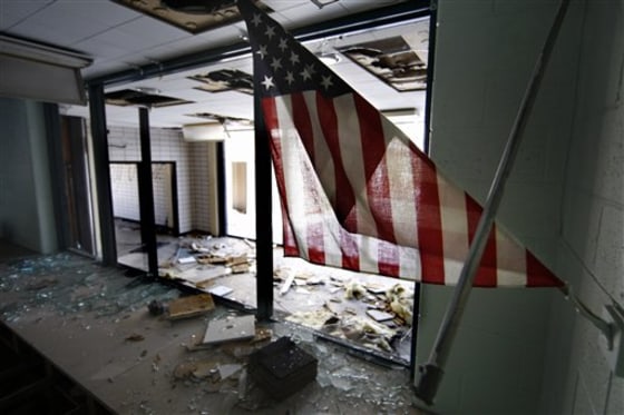 A&nbsp;flag remains hanging in the principal's office at the Frederick Douglass High School in Detroit. 